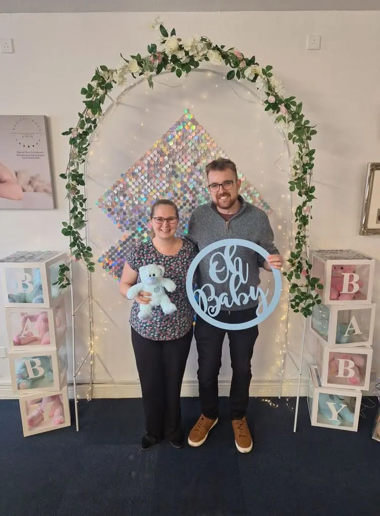 Happy family at their baby scan
