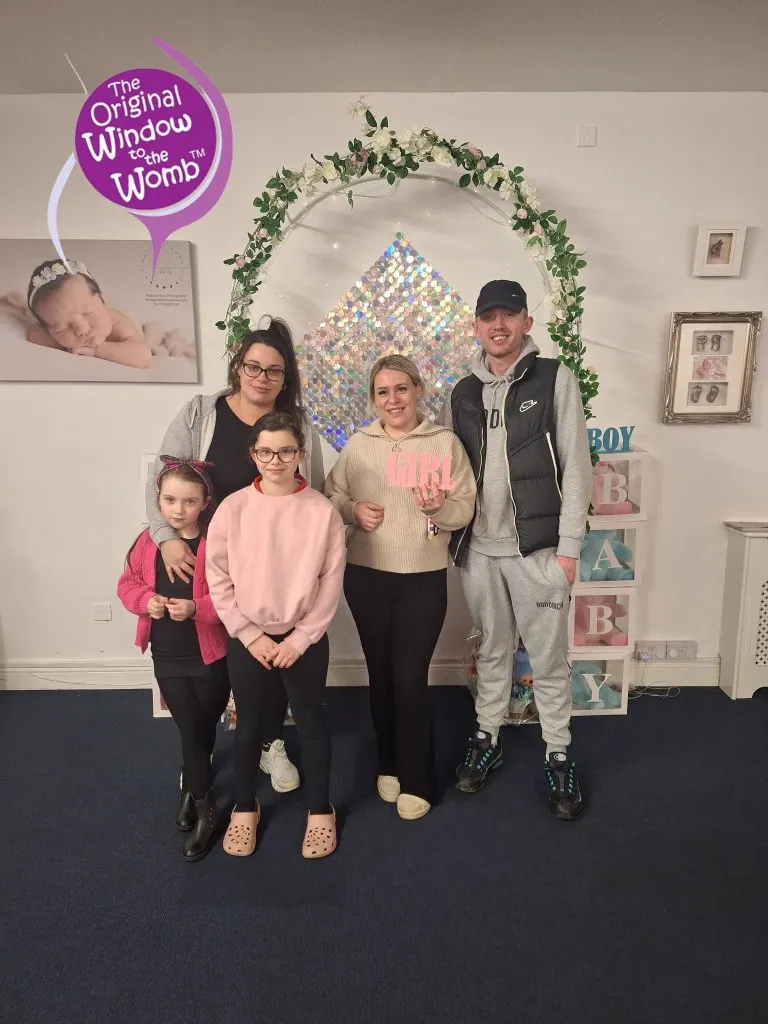 Happy family at their baby scan